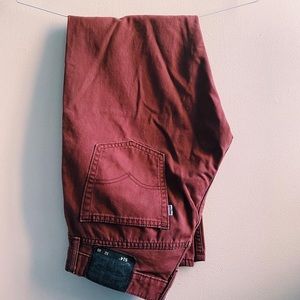 rust colored levi’s jeans